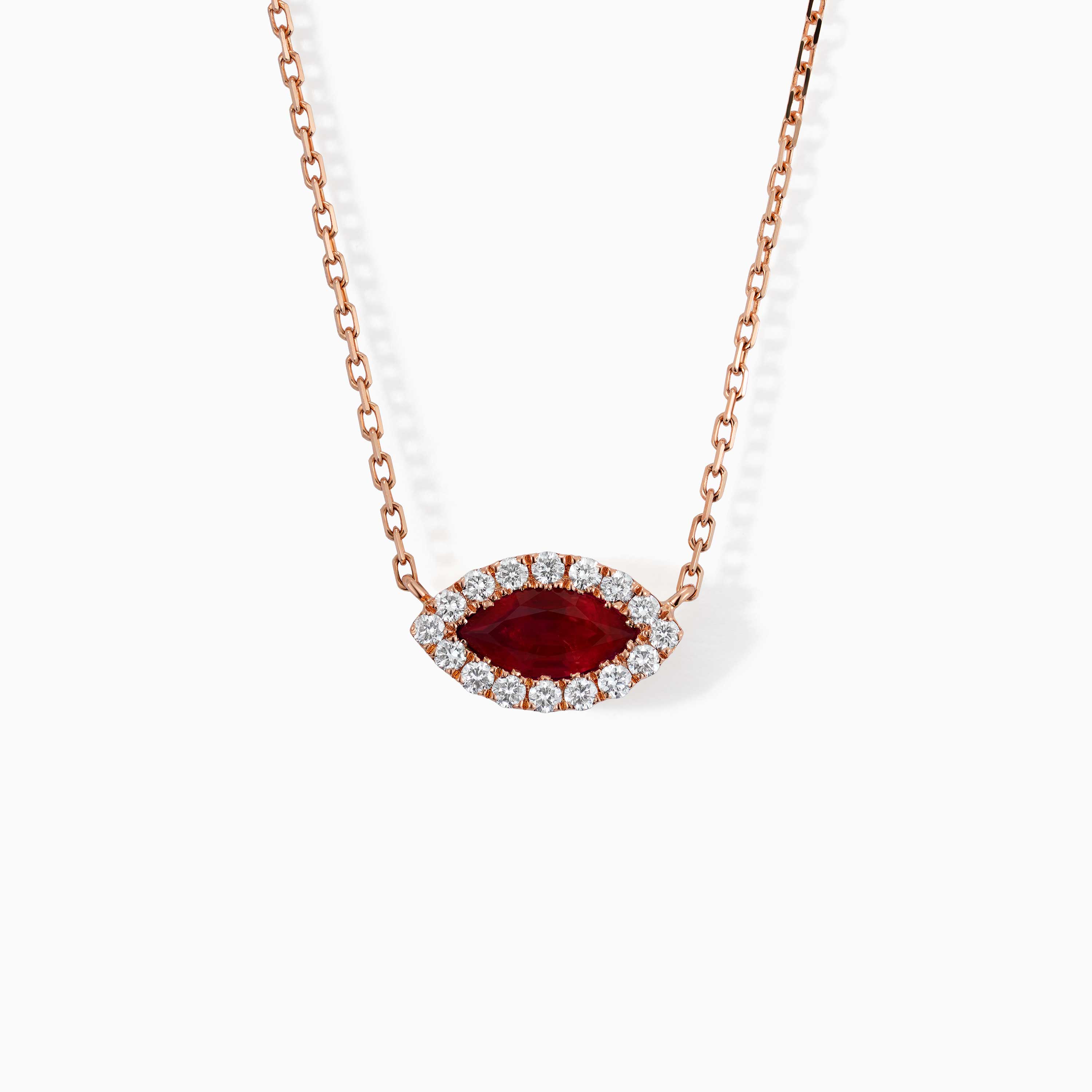 Rose gold necklace with a marquise ruby center stone surrounded by diamonds on a white background.